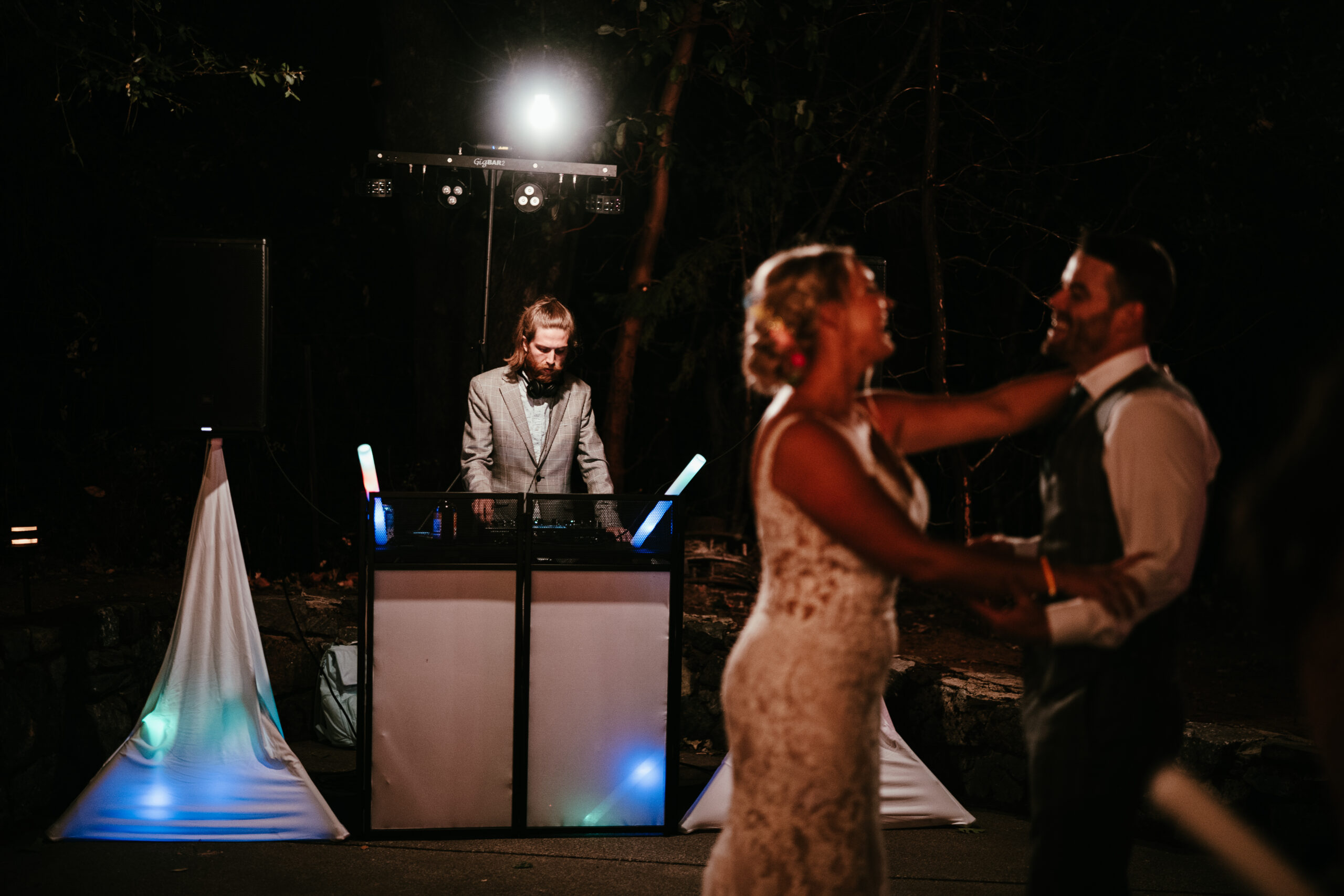 Wedding dj playing music during couples first dance